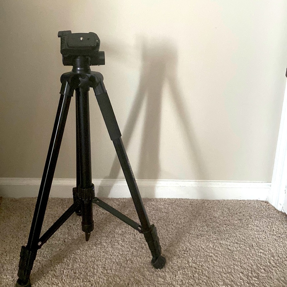 UBeesize slightly used camera tripod, user friendly, stable and portable.